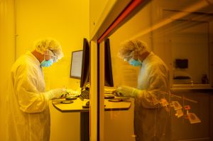 Work is performed in one of the clean rooms at Sandia National Laboratories’ Center for Integrated Nanotechnologies. (Photo by Craig Fritz) Click on the thumbnail for a high-resolution image.
