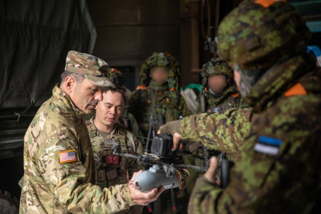 Gen. Christopher Donahue, the commanding general of U.S. Army Europe and Africa (USAREUR-AF), holds an Estonian soldier's drone during Exercise Hedgehog 25 near Camp Reedo, Estonia on May 15, 2025. Exercise Hedgehog 25 is a large-scale...