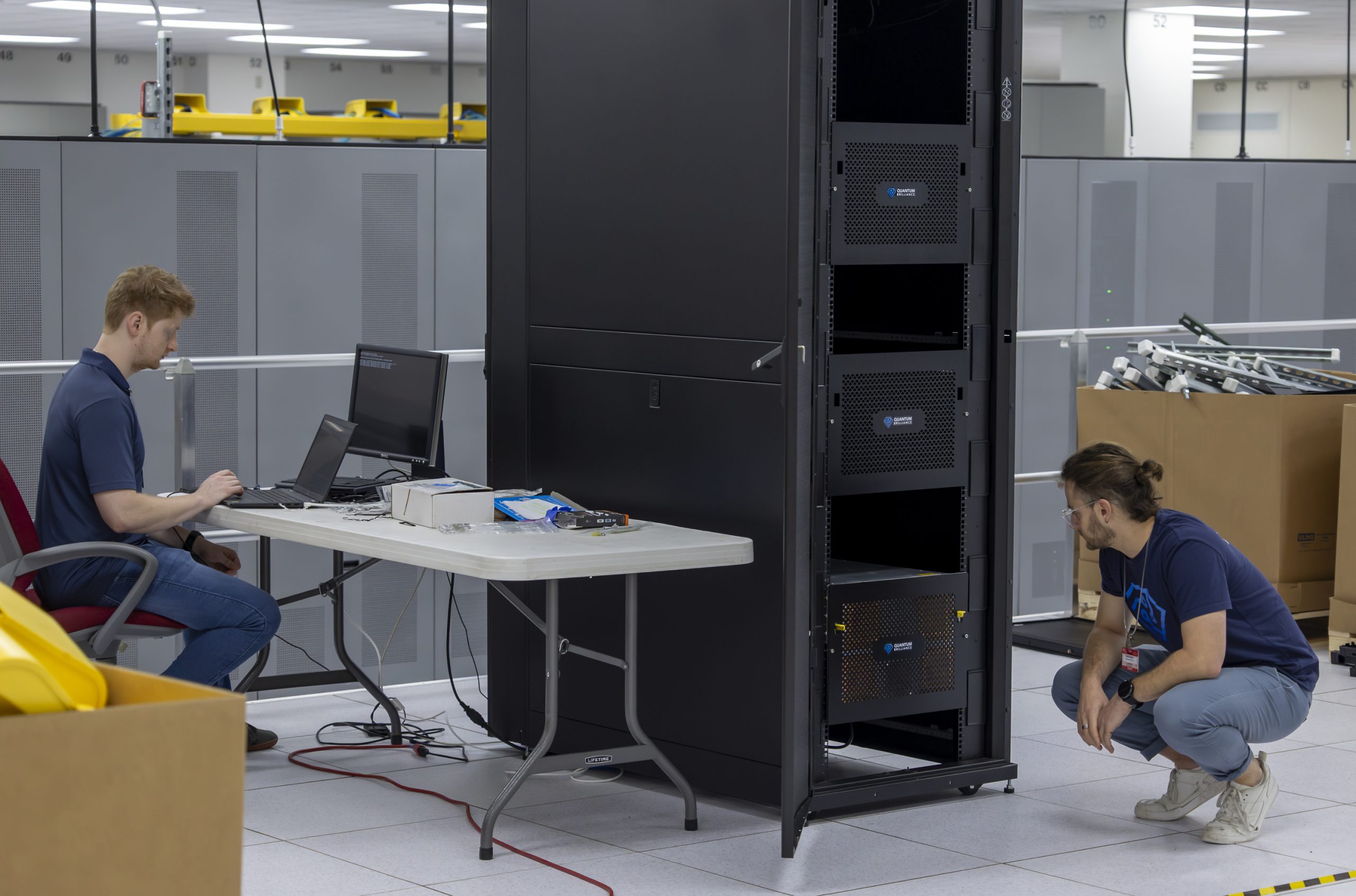 Two researchers are working on the quantum brilliance computer